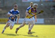 22 June 2011; James Breen, Wexford, in action against Pakie Flynn, Laois. Bord Gais Energy Leinster GAA U-21 Hurling Championship 2011 Semi-Final, Wexford v Laois, Wexford Park, Wexford. Picture credit: Matt Browne / SPORTSFILE