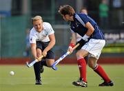 22 June 2011; Michael Watt, Ireland, in action against Valentin Migneau, France. UCD Men's 4 Nations Tournament, Ireland v France, National Hockey Stadium, UCD, Belfield, Dublin. Picture credit: Barry Cregg / SPORTSFILE