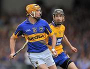 19 June 2011; Seamus Callanan, Tipperary, in action against Patrick Donnellan, Clare. Munster GAA Hurling Senior Championship Semi-Final, Clare v Tipperary, Gaelic Grounds, Limerick. Picture credit: David Maher / SPORTSFILE