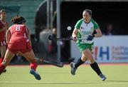 23 June 2011; Lisa Jacob, Ireland, in action against Rachel Dawson, USA. ESB Electric Ireland Champions Challenge Quarter-Final, Ireland v USA, National Hockey Stadium, UCD, Belfield, Dublin. Picture credit: Matt Browne / SPORTSFILE