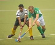 24 June 2011; Michael Watt, Ireland, in action against Muhammad Waqas, Pakistan. UCD Men's 4 Nations Tournament, Ireland v Pakistan, National Hockey Stadium, UCD, Belfield, Dublin. Photo by Sportsfile