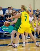25 June 2011; Bridget O'Reilly Synnott, Team Ireland, from Clongriffin, Dublin, is tackled by Eliza Mills, Australia, during a divisioning game. 2011 Special Olympics World Summer Games, OAKA Olympic Indoor Hall, Athens Olympic Sport Complex, Athens, Greece. Picture credit: Ray McManus / SPORTSFILE