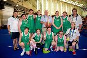 25 June 2011; Minister of State for of Tourism and Sport Michael Ring T.D., with Team Ireland players and coaches, Claire Heffernan, left, Dundrum, Dublin, Audrey Galvin, Rochestown, Cork, Eileen Hayes, Kill, Co. Waterford, Sarah Byrne, Palmerstown, Dublin, Laura Reynolds, Ballymoney Upr, Co. Wicklow, Laura Mangan, Drumcondra, Dublin, and Antionette Campbell, Dundalk, Co. Louth. Front row; left to right, Nichola Farrell, Leopardstown, Dublin 18, Amy Duffy, Lusk, Co. Dublin, Ann Marie Cooney, Straffan, Co. Kildare, Bridget O'Reilly Synnott, Clongriffin, Dublin, and Bernie Corroon, Mullingar, Co. Westmeath, after a divisioning game. 2011 Special Olympics World Summer Games, OAKA Olympic Indoor Hall, Athens Olympic Sport Complex, Athens, Greece. Picture credit: Ray McManus / SPORTSFILE