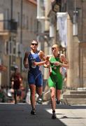 25 June 2011; Ireland's Aileen Morrison, from Derry, in action during the Elite Women's race, alongside Hollie Avil, Great Britain. Aileen finished in 14th position, in a time of 2:07:28. 2011 Pontevedra ETU Triathlon European Championships - Elite Women, Pontevedra, Spain. Picture credit: Stephen McCarthy / SPORTSFILE