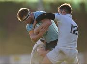 28 January 2017; Peadar Timmins of UCD is tackled by Evan Mintern, left, and Niall Kenneally of Cork Constitution during the Ulster Bank League Division 1A match between UCD and  Cork Constitution at Belfield Bowl in UCD, Belfield, Dublin. Photo by Seb Daly/Sportsfile