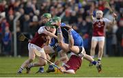 28 January 2017; Paddy Cadell of Our Lady’s Templemore runs past upturned team-mate Neil Quinlan as Ciarán Kelly, left, and Ruairí Maher of Nenagh CBS look on during the Dr. Harty Cup Semi-final match between Our Lady’s Templemore and Nenagh CBS at Toomevara in Co. Tipperary. Photo by Piaras Ó Mídheach/Sportsfile