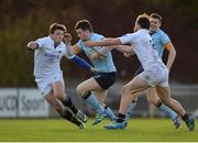 28 January 2017; Stephen Murphy of UCD in action against Ned Hodson, left, and Max Abbott of Cork Constitution during the Ulster Bank League Division 1A match between UCD and  Cork Constitution at Belfield Bowl in UCD, Belfield, Dublin. Photo by Seb Daly/Sportsfile