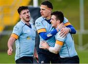 28 January 2017; Stephen Murphy of UCD is congratulated by teammates Brian Cawley, centre, and Sean McNulty, after scoring his side's first try of the match during the Ulster Bank League Division 1A match between UCD and  Cork Constitution at Belfield Bowl in UCD, Belfield, Dublin. Photo by Seb Daly/Sportsfile