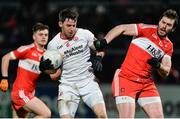 28 January 2017; Matthew Donnelly of Tyrone in action against Mark Lynch of Derry during the Bank of Ireland Dr. McKenna Cup Final match between Tyrone and Derry at Pairc Esler in Newry, Co. Down. Photo by Oliver McVeigh/Sportsfile