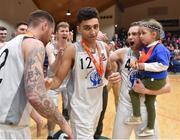 28 January 2017; MVP Sean Jenkins of Neptune is congratulated by his team-mates after the Hula Hoops President's Cup Final match between Neptune and EJ Sligo All Stars at National Basketball Arena in Tallaght, Co. Dublin. Photo by Brendan Moran/Sportsfile