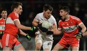 28 January 2017; Matthew Donnelly of Tyrone in action against James Kielt and Ronan Murphy of Derry during the Bank of Ireland Dr. McKenna Cup Final match between Tyrone and Derry at Pairc Esler in Newry, Co. Down. Photo by Oliver McVeigh/Sportsfile