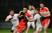 28 January 2017; Peter Hagan of Derry in action against Ronan O'Neill and Mark Bradley of Tyrone during the Bank of Ireland Dr. McKenna Cup Final match between Tyrone and Derry at Pairc Esler in Newry, Co. Down. Photo by Oliver McVeigh/Sportsfile