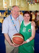 25 June 2011; Minister of State for of Tourism and Sport Michael Ring T.D., with Anne Marie Cooney, Team Ireland, from Straffan, Co. Kildare, after a divisioning game. 2011 Special Olympics World Summer Games, OAKA Olympic Indoor Hall, Athens Olympic Sport Complex, Athens, Greece.  Picture credit: Ray McManus / SPORTSFILE