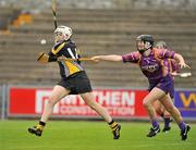 25 June 2011; Áine Fahy, Kilkenny, in action against Catherine O'Loughlin, Wexford. All-Ireland Senior Camogie Championship Round 3 in association with RTE Sport, Wexford v Kilkenny, Wexford Park, Co. Wexford. Picture credit: Barry Cregg / SPORTSFILE