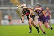 25 June 2011; Aoife Neary, Kilkenny, in action against Michelle O'Leary, Wexford. All-Ireland Senior Camogie Championship Round 3 in association with RTE Sport, Wexford v Kilkenny, Wexford Park, Co. Wexford. Picture credit: Barry Cregg / SPORTSFILE