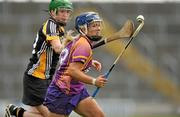 25 June 2011; Katriona Parrock, Wexford, in action against Denise Gaule, Kilkenny. All-Ireland Senior Camogie Championship Round 3 in association with RTE Sport, Wexford v Kilkenny, Wexford Park, Co. Wexford. Picture credit: Barry Cregg / SPORTSFILE