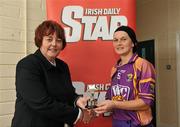 25 June 2011; Chairperson of the Leinster Camogie Board Catherine Neary presents Noeleen Lambert, Wexford, with the player of the match award. All-Ireland Senior Camogie Championship Round 3 in association with RTE Sport, Wexford v Kilkenny, Wexford Park, Co. Wexford. Picture credit: Barry Cregg / SPORTSFILE