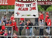 25 June 2011; Louth supporters hold up a banner. GAA Football All-Ireland Senior Championship Qualifier Round 1, Louth v Meath, Kingspan Breffni Park, Co. Cavan. Picture credit: David Maher / SPORTSFILE