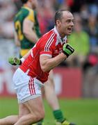 25 June 2011; Darren Clarke, Louth, celebrates after scoring his side's first goal. GAA Football All-Ireland Senior Championship Qualifier Round 1, Louth v Meath, Kingspan Breffni Park, Co. Cavan. Picture credit: David Maher / SPORTSFILE