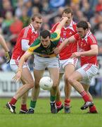 25 June 2011; Paddy O'Rourke, Meath, in action against Paddy Keenan, left, Michael Fanning and Derek Crilly, right, Louth. GAA Football All-Ireland Senior Championship Qualifier Round 1, Louth v Meath, Kingspan Breffni Park, Co. Cavan. Photo by Sportsfile