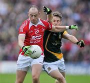 25 June 2011; Darren Clarke, Louth, in action against Chris O'Connor, Meath. GAA Football All-Ireland Senior Championship Qualifier Round 1, Louth v Meath, Kingspan Breffni Park, Co. Cavan. Picture credit: David Maher / SPORTSFILE