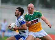 25 June 2011; Neil McAdam, Monaghan, is shouldered in the back by Scott Brady, Offaly. GAA Football All-Ireland Senior Championship Qualifier Round 1, Offaly v Monaghan, O'Connor Park, Tullamore, Co. Offaly. Picture credit: Dáire Brennan / SPORTSFILE