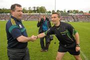 25 June 2011; Meath manager Seamus Mcenaney shakes hand with referee Maurice Deegan before the game. GAA Football All-Ireland Senior Championship Qualifier Round 1, Louth v Meath, Kingspan Breffni Park, Co. Cavan. Photo by Sportsfile