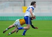 25 June 2011; Ciarán Hughes, Monaghan, in action against Bernard Allen, Offaly. GAA Football All-Ireland Senior Championship Qualifier Round 1, Offaly v Monaghan, O'Connor Park, Tullamore, Co. Offaly. Picture credit: Dáire Brennan / SPORTSFILE
