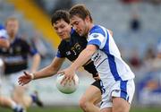 25 June 2011; MJ Tierney, Laois, in action against Ciaran McDonald, Tipperary. GAA Football All-Ireland Senior Championship Qualifier Round 1, Laois v Tipperary, O'Moore Park, Portlaoise, Co. Laois. Picture credit: Brendan Moran / SPORTSFILE