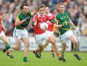 25 June 2011; Andy McDonnell, Louth, in action against Shane McAnarney, left and Ciaran Lenehan, Meath. GAA Football All-Ireland Senior Championship Qualifier Round 1, Louth v Meath, Kingspan Breffni Park, Co. Cavan. Photo by Sportsfile