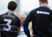 25 June 2011; Tipperary manager John Evans speaks to his players after the game. GAA Football All-Ireland Senior Championship Qualifier Round 1, Laois v Tipperary, O'Moore Park, Portlaoise, Co. Laois. Picture credit: Brendan Moran / SPORTSFILE