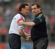 25 June 2011; Seamus McEnaney Meath manager shakes hands with Louth manager Peter Fitzpatrick at the end of the game. GAA Football All-Ireland Senior Championship Qualifier Round 1, Louth v Meath, Kingspan Breffni Park, Co. Cavan. Picture credit: David Maher / SPORTSFILE