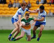 25 June 2011; Niall McNamee, Offaly, in action against Kieran Duffy, left, and Conor Galligan, Monaghan. GAA Football All-Ireland Senior Championship Qualifier Round 1, Offaly v Monaghan, O'Connor Park, Tullamore, Co. Offaly. Picture credit: Dáire Brennan / SPORTSFILE