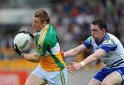 25 June 2011; Seán Ryan, Offaly, in action against Owen Duffy, Monaghan. GAA Football All-Ireland Senior Championship Qualifier Round 1, Offaly v Monaghan, O'Connor Park, Tullamore, Co. Offaly. Picture credit: Dáire Brennan / SPORTSFILE