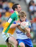 25 June 2011; Donal Morgan, Monaghan, in action against Joe Bergin, Offaly. GAA Football All-Ireland Senior Championship Qualifier Round 1, Offaly v Monaghan, O'Connor Park, Tullamore, Co. Offaly. Picture credit: Dáire Brennan / SPORTSFILE