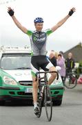 25 June 2011; Greg Swinard, Usher IRC, celebrates as he crosses the finish line to win the Veteran Men's Road Race National Championships. Scotstown, Co. Monaghan. Picture credit: Stephen McMahon / SPORTSFILE