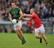 25 June 2011; Graham Reilly, Meath, in action against Ray Finnegan, Louth. GAA Football All-Ireland Senior Championship Qualifier Round 1, Louth v Meath, Kingspan Breffni Park, Co. Cavan. Picture credit: David Maher / SPORTSFILE