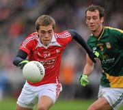 25 June 2011; Andy McDonnell, Louth, in action against Jamie Queeney, Meath. GAA Football All-Ireland Senior Championship Qualifier Round 1, Louth v Meath, Kingspan Breffni Park, Co. Cavan. Picture credit: David Maher / SPORTSFILE