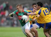 26 June 2011; Shane Irwin, Mayo, in action against Donal Smith, 11, and Enda Lannon, Roscommon. Connacht GAA Football Minor Championship Semi-Final, Mayo v Roscommon, McHale Park, Castlebar, Co. Mayo. Picture credit: Matt Browne / SPORTSFILE