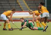 26 June 2011; Elizabeth Colvin, Ireland, in action against Celia Evans, left, Tarryn Bright and Lesle Ann George, 17, South Africa. ESB Electric Ireland Champions Challenge Finals, Ireland v South Africa, National Hockey Stadium, UCD, Belfield, Co. Dublin. Picture credit: Ray Lohan / SPORTSFILE