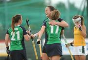 26 June 2011; Ireland's Nikki Symmons, 17,  is congratulated by Audrey O'Flynn and Elizabeth Colvin, 21, after scoring her sides only goal. ESB Electric Ireland Champions Challenge Finals, Ireland v South Africa, National Hockey Stadium, UCD, Belfield, Co. Dublin. Picture credit: Ray Lohan / SPORTSFILE