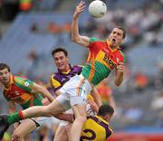 26 June 2011; Brendan Murphy, Carlow, in action against Joey Wadding, 2 and Daithi Waters, Wexford. Leinster GAA Football Senior Championship Joey Wadding, no.2 and Daithi WatersSemi-Final, Wexford v Carlow, Croke Park, Dublin. Picture credit: David Maher / SPORTSFILE