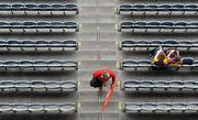 26 June 2011; A Carlow supporter looks for his seat as he passes Wexford supporters at the Leinster GAA Senior Football Championship Semi-Finals. Croke Park, Dublin. Picture credit: Brendan Moran / SPORTSFILE