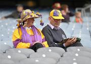 26 June 2011; Wexford supporters Liz and Des McCabe, from Trinity Taghmon, Co. Wexford, read their match programme prior to the Leinster GAA Senior Football Championship Semi-Finals. Croke Park, Dublin. Photo by Sportsfile