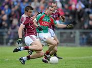 26 June 2011; Paul Conroy, Galway, scores his side's first goal against Mayo despite the efforts of Keith Higgins. Connacht GAA Football Senior Championship Semi-Final, Mayo v Galway, McHale Park, Castlebar, Co. Mayo. Picture credit: Matt Browne / SPORTSFILE