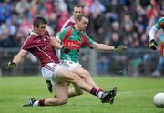 26 June 2011; Paul Conroy, Galway, scores the first goal against Mayo despite the tackle of Keith Higgins. Connacht GAA Football Senior Championship Semi-Final, Mayo v Galway, McHale Park, Castlebar, Co. Mayo. Picture credit: Matt Browne / SPORTSFILE