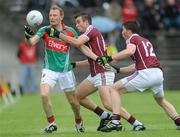 26 June 2011; Richie Feeney, Mayo, in action against Paul Conroy and Gareth Bradshaw, right, Galway. Connacht GAA Football Senior Championship Semi-Final, Mayo v Galway, McHale Park, Castlebar, Co. Mayo. Picture credit: Ray Ryan / SPORTSFILE