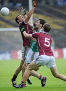 26 June 2011; Kevin McLoughlin, Mayo, in action against Joe Bergin and Gary O'Donnell, 5, Galway. Connacht GAA Football Senior Championship Semi-Final, Mayo v Galway, McHale Park, Castlebar, Co. Mayo. Picture credit: Matt Browne / SPORTSFILE