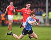 29 January 2017; Niall Walsh of Dublin in action against Derek Maguire of Louth during the Bord na Mona O'Byrne Cup Final match between Louth and Dublin at the Gaelic Grounds in Drogheda, Co Louth. Photo by Ray McManus/Sportsfile