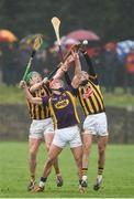 29 January 2017; Lee Chin of Wexford in action against Paul Murphy and Cillian Buckley of Kilkenny during the Bord na Mona Walsh Cup Semi-Final match between Wexford and Kilkenny at O'Kennedy Park in New Ross, Co Wexford. Photo by Matt Browne/Sportsfile